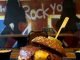 lvis Burger with double Angus beef patties, American cheese, turkey bacon, and truffle honey glaze at Band of Burgers restaurant in London